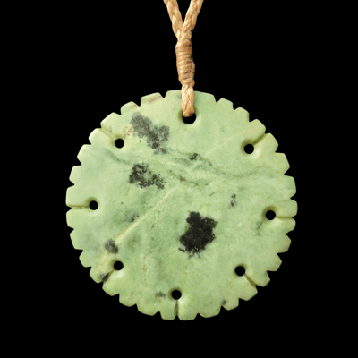 porohita kokopu greenstone disc pendant by sands carving studio