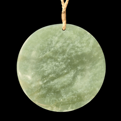 porohita inanga greenstone disc pendant by sands carving studio