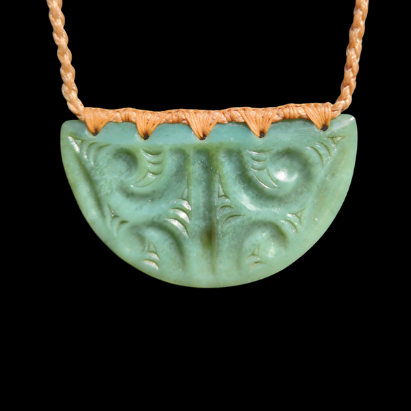 Kōuma Inanga Moko Kauae- Greenstone Breastplate Pendant