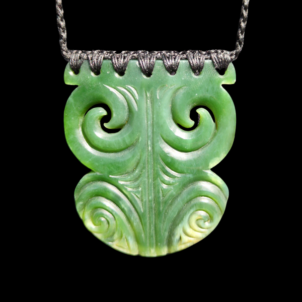 Kōuma Inanga Moko Kauae- Greenstone Breastplate Pendant