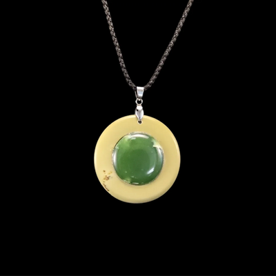 Kahurangi and Raukaraka Porohita - Greenstone Disc Pendant - Sands Carving Studio