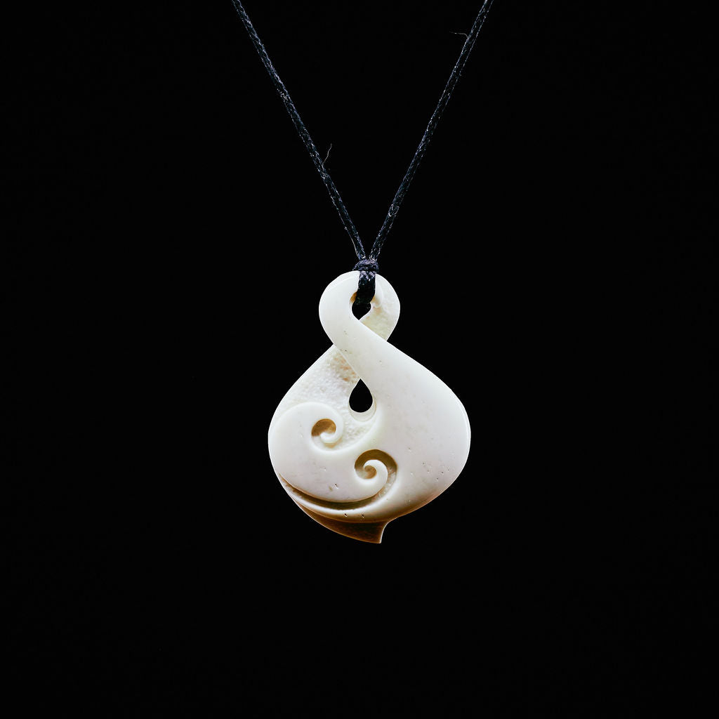 Hand Carved New Zealand Maori Inspired Aged Bone Koru Spiral Necklace –  Earthbound Pacific