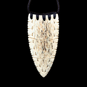 Koiwi Tohorā Rei Niho - Carved Whale Bone Tooth Pendant